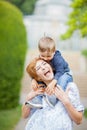 Mother and son having fun together, giggle, happy and smiling