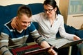 Mother and son with laptops