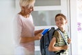 Mother with son leaving for school