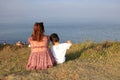 Mother and son look at the sea at zhenhaijiao peninsula, adobe rgb