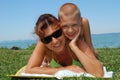 Mother and son lying in sun Royalty Free Stock Photo