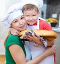 Mother with son making bread Royalty Free Stock Photo