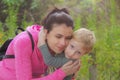 Mother and son in the Park and enjoying the beautiful autumn nature.Concept mum and son, childhood, happy life Royalty Free Stock Photo