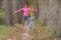 Mother and son in the Park and enjoying the beautiful autumn nature.Concept mum and son, childhood, happy life Royalty Free Stock Photo