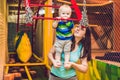 Mother and son passes the obstacle course in the sports club Royalty Free Stock Photo