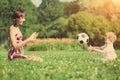 Mother and son playing ball in the park. Royalty Free Stock Photo