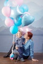 Mother and son playing with balloons. Concept of happy family. Birthday of the kid Royalty Free Stock Photo