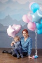 Mother and son playing with balloons. Concept of happy family. Birthday of the kid Royalty Free Stock Photo