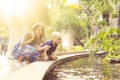 Mother and son playing in the fountain Royalty Free Stock Photo