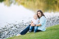 Mother and son playing near the lake Royalty Free Stock Photo