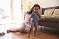 Mother And Son Playing With Toys On Floor At Home Royalty Free Stock Photo