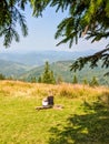 Mother with son relaxing on the carpathian mountains background Royalty Free Stock Photo