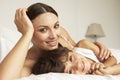 Mother And Son Relaxing On Bed Royalty Free Stock Photo