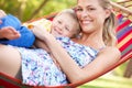 Mother And Son Relaxing In Hammock Royalty Free Stock Photo