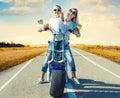 Mother and son rides on motorbike. Royalty Free Stock Photo