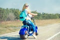 Mother and son rides on motorbike. Royalty Free Stock Photo