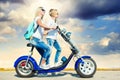 Mother and son rides on motorbike. Royalty Free Stock Photo