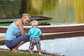 Mother and son by the river