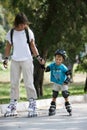 Mother and son rollerskating