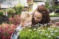 Mother and son shopping in gardening center Royalty Free Stock Photo