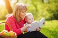 Mother with son sitting and read fairytale