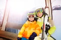 Mother and son in ski lift happy smile wear masks Royalty Free Stock Photo