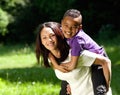 Mother and son smiling together outdoors Royalty Free Stock Photo