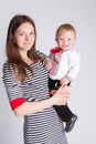 Mother and son in studio background