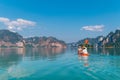 Mother with son together floating on kayak by the Cheow Lan lake in exotic Thailand. Traveling with kids concept image