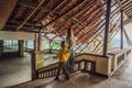 Mother and son tourists in abandoned and mysterious hotel in Bedugul. Indonesia, Bali Island. Bali Travel Concept