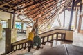 Mother and son tourists in abandoned and mysterious hotel in Bedugul. Indonesia, Bali Island. Bali Travel Concept