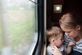 Mother and son on a train trip Royalty Free Stock Photo