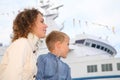 Mother, son and white ship