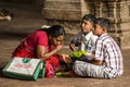 Mother with sons eat