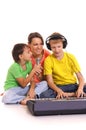 mother and sons with piano Royalty Free Stock Photo