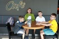 Mother with sons waiting food Royalty Free Stock Photo