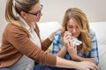 Mother soothes sad teen daughter crying Royalty Free Stock Photo