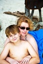 Mother is spooning with her happy smiling son Royalty Free Stock Photo