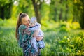 Mother strong embraces the newborn son