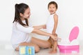 Mother successfully teaches child potty training Royalty Free Stock Photo