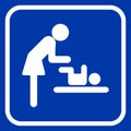 Mother swaddles the baby icon on blue background