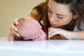 Mother takes care of a newborn baby