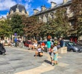 Mother takes photo of her two small children in Paris,