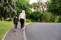 Mother taking daughter to school. Back view. Royalty Free Stock Photo