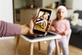 Mother taking photo of child at home. Modern motherhood Royalty Free Stock Photo