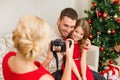 Mother taking picture of father and daughter Royalty Free Stock Photo