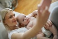 Mother taking self portrait of her and her baby boy at home. Royalty Free Stock Photo