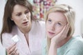 Mother Talking To Teenage Daughter About Contraception