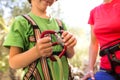 A woman instructs how to use a carabiner for belaying Royalty Free Stock Photo