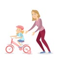 Mother teaching cycling.